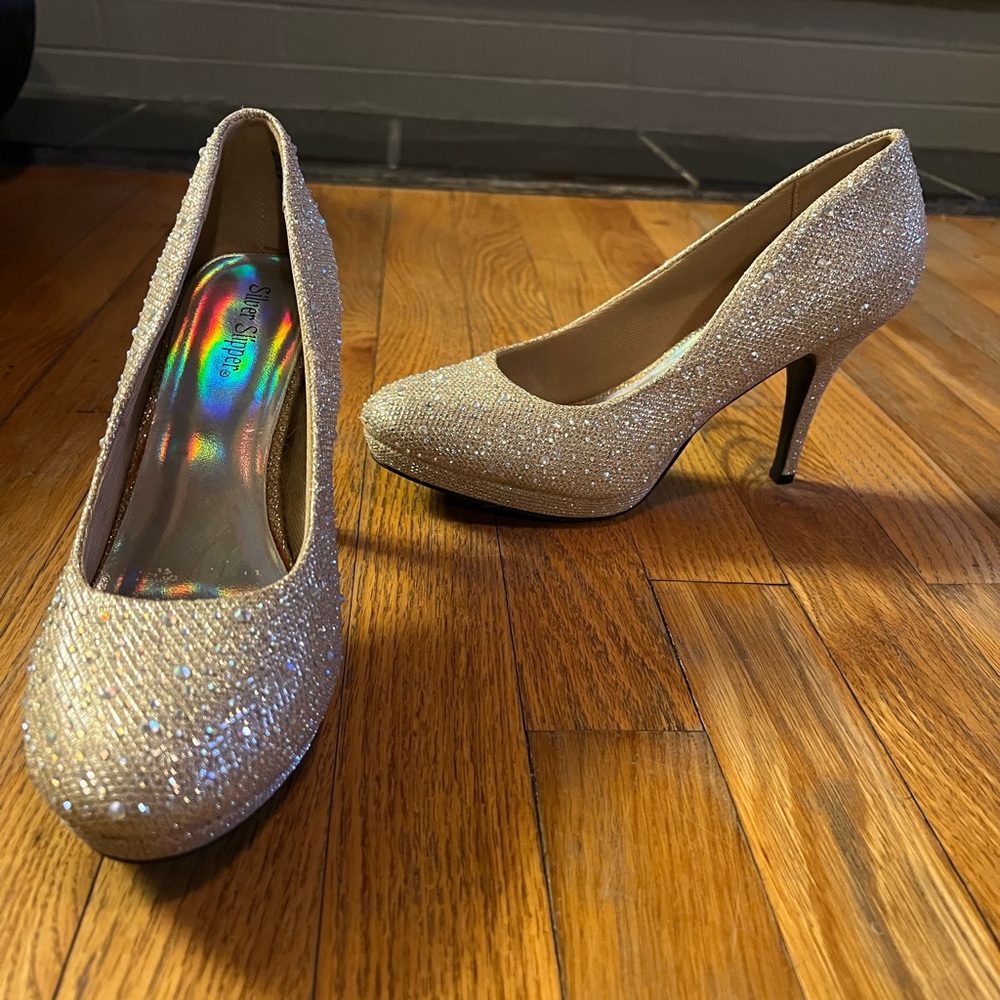 Champagne colored heels with rhinestone details size 8 1/2. Like new condition.